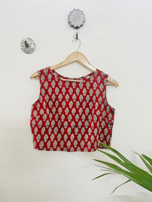 RED SIDE-BUTTON-DETAIL SLEEVELESS COTTON BLOUSE