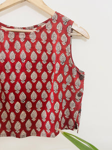 RED SIDE-BUTTON-DETAIL SLEEVELESS COTTON BLOUSE